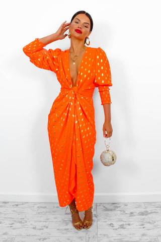 orange and gold wrap dress Make an unforgettable entrance., Our vibrant Luna Wrap Dress in Golden as styled by @alexandra.e.style is guaranteed to spark joy., Shop online and in-store. , #HANNAHartwear #HANNAHbotanica